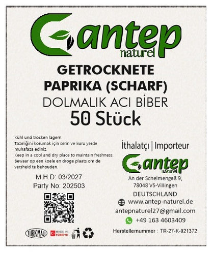 Nahaufnahme des Produktetiketts von Gantep Naturel für getrocknete Paprika (scharf), 50 Stück, mit Zutatenhinweis, Herstellerangabe und Lagerungshinweis in mehreren Sprachen.