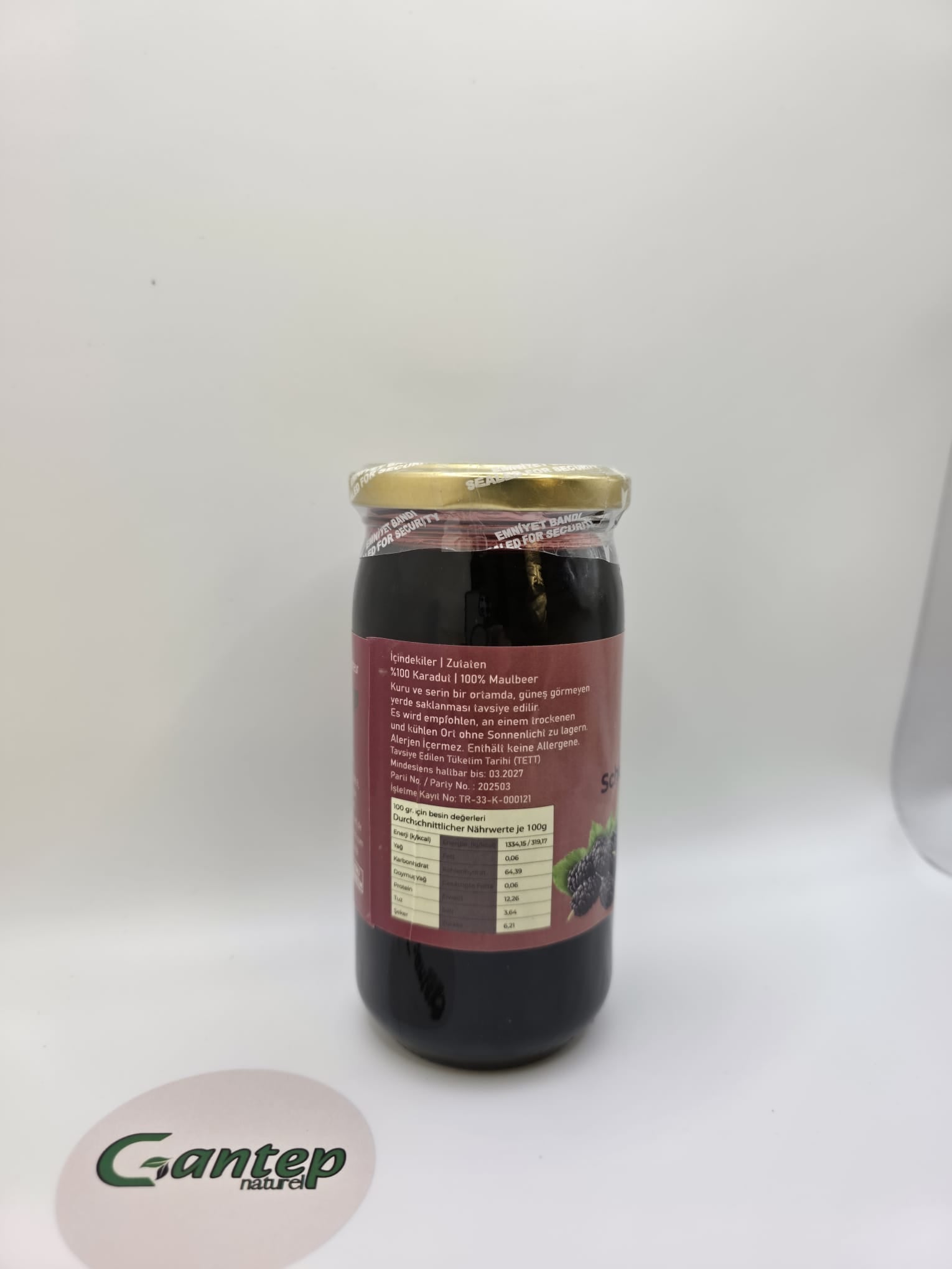 Seitliche Aufnahme der Glasverpackung des Maulbeerextrakts von Gantep Naturel mit detaillierten Nährwert- und Zutatenangaben.